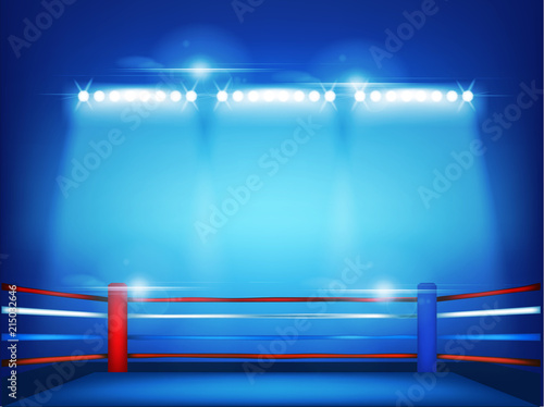 Boxing ring surrounded by spotlight on blue background