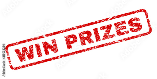 WIN PRIZES stamp seal print with scratced style. Red vector rubber print of WIN PRIZES text with unclean texture. Text title is placed inside rounded rectangle frame.