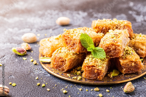 Homemade baklava with nuts and honey. photo