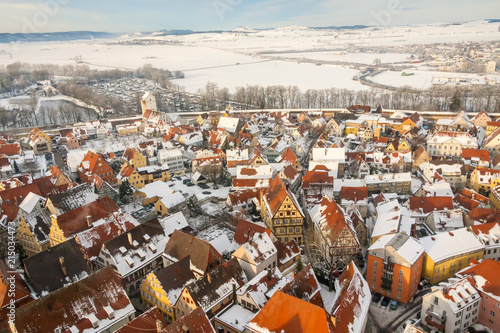 Top view on winter panorama of medieval town within fortified wall. Romantic Road route, Nordlingen, Bavaria, Germany.