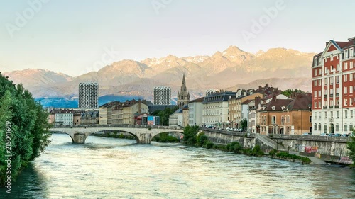 Time lapse over Isere river with mountain background in Grenoble, France