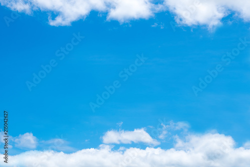 Blue sky with soft tiny cloud, cloudscape on sunny day for background or postcard.