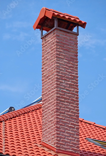  house from a red brick with a pipe