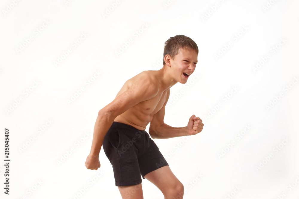 teenager with muscles. emotions of the winner. teenager with muscles. emotions of the winner.