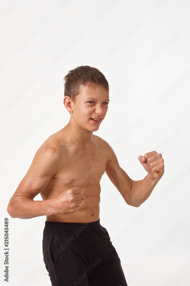teenager with muscles. emotions of the winner. teenager with muscles. emotions of the winner.