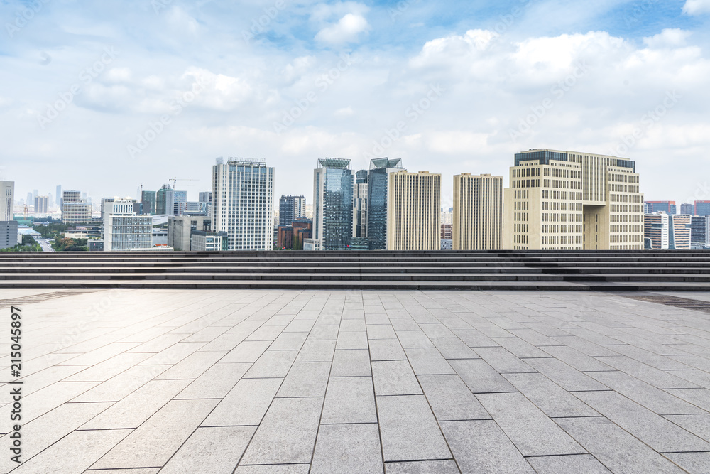 Panoramic skyline and modern business office buildings with empty road,empty concrete square floor