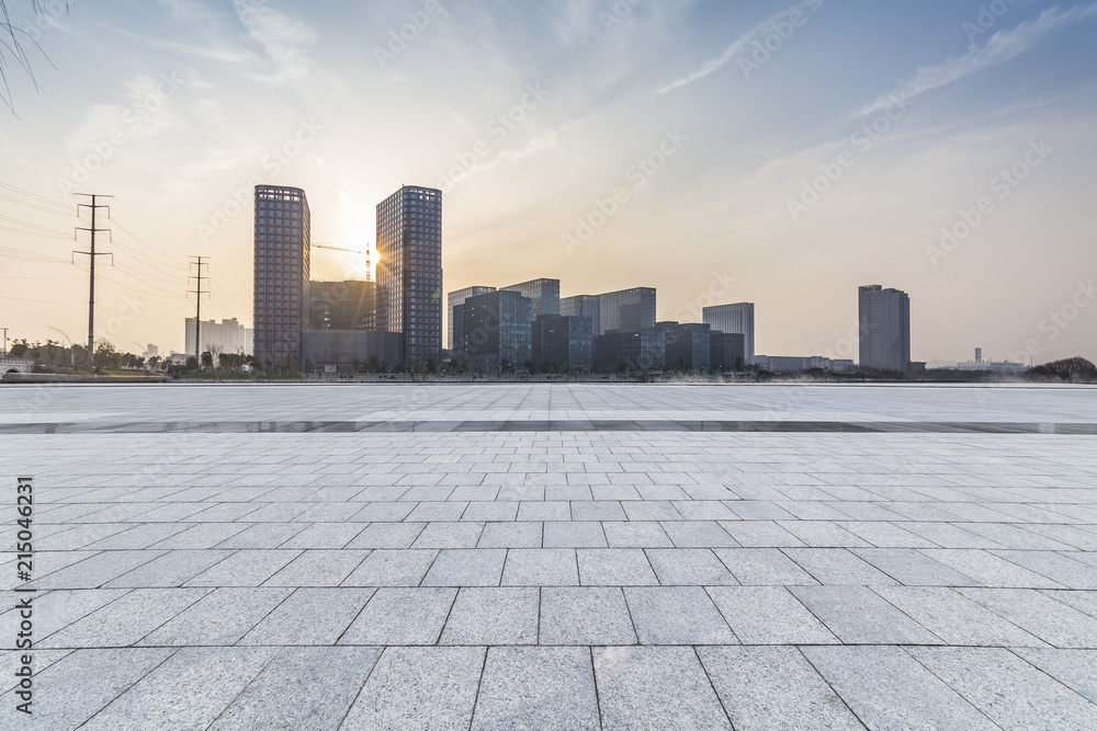 Fototapeta premium Panoramic skyline and modern business office buildings with empty road,empty concrete square floor