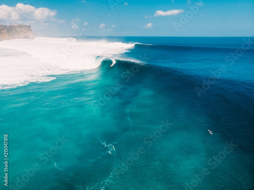 Aerial view of big wave surfing in Bali. Big waves in ocean