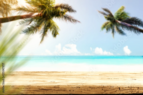 Table background and sea landscape with two palms 