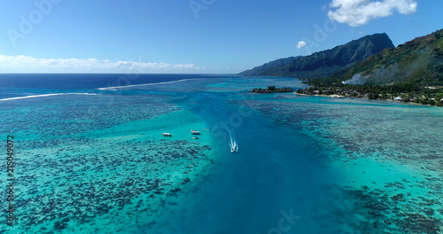 boats in a lagoon in French Polynesia, in aerial view