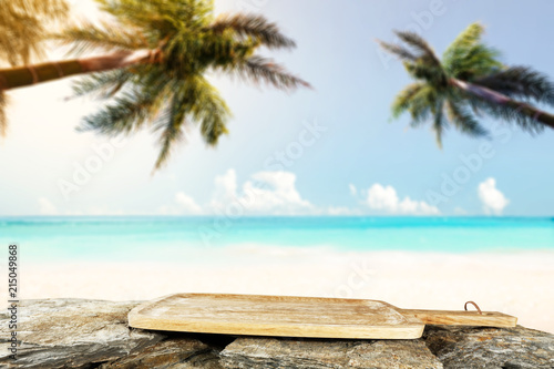 Table background and sea landscape with two palms 