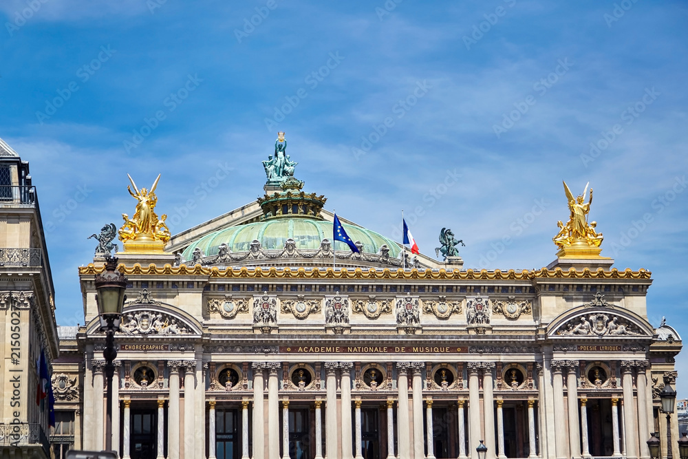 Palais or Opera Garnier & The National Academy of Music (Grand Opéra). Detail of the main southern facade of the building with gold sculptures. Paris, France, Europe