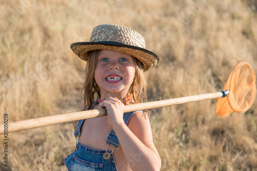 Smiling child with butterfly net