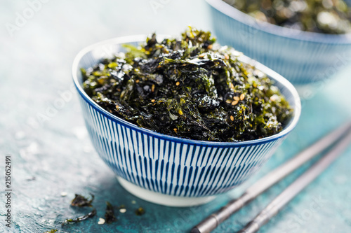 Crispy dried seaweed nori with sesame and sea salt. Asian cuisine photo