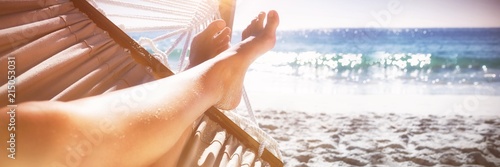 Woman relaxing on hammock