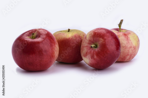 Fresh sweet red apples isolated on white background