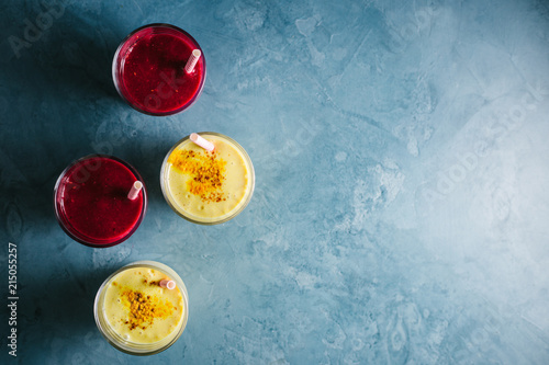 Golden yogurt milk with turmeric and red smoothie