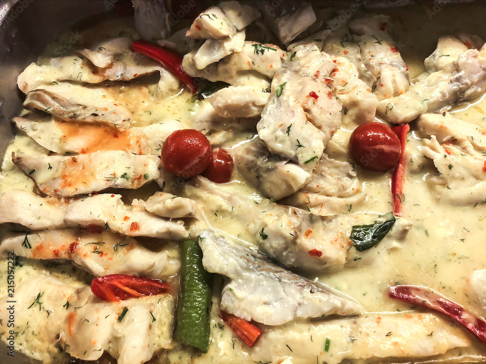 Pieces of fish in white sauce Pieces of fish in white sauce