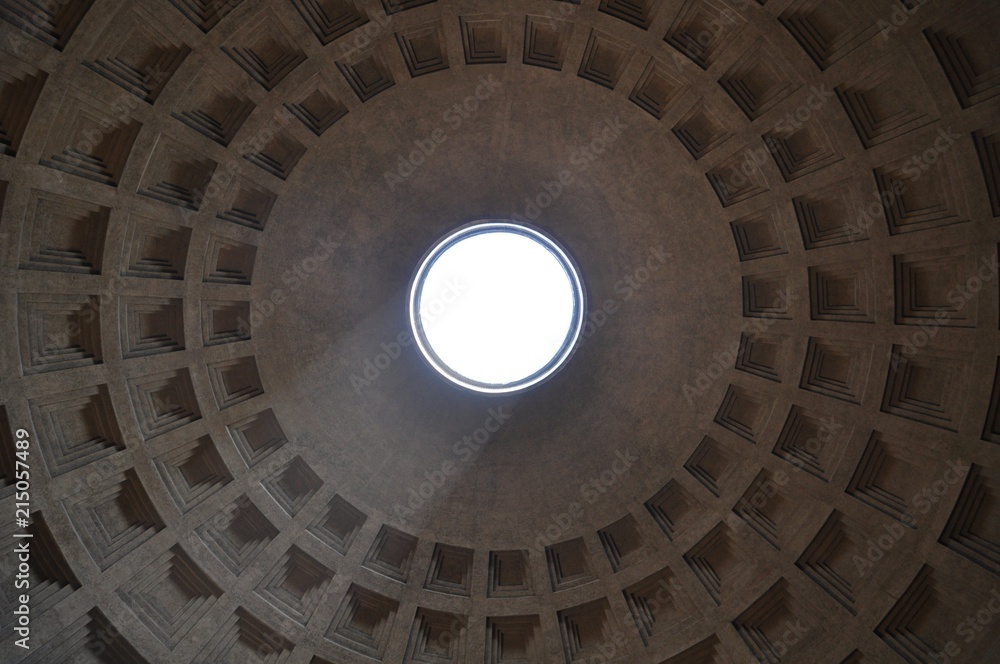 Light is coming in from a dome in an ancient Italian building