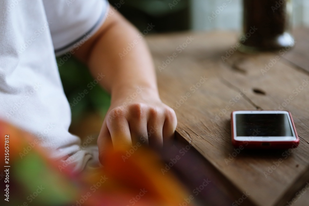 People hand using smartphone closeup interior blur background. Concept of Technology People hand using smartphone closeup interior blur background. Concept of Technology