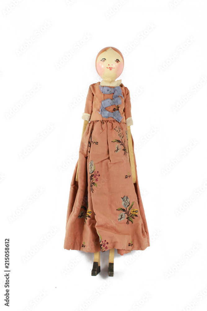 Wooden Carved Antique Doll on White Background