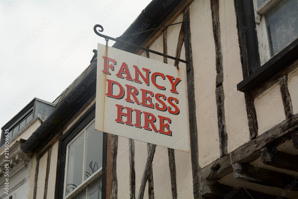 Obraz premium Fancy Dress Hire sign outside shop