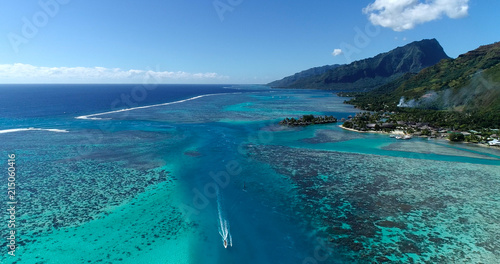 hotel with overwater bungalow in a lagoon in French Polynesia photo