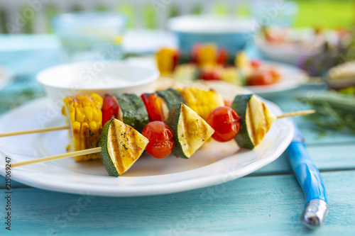 Delicious grilled skewers of colorful vegetables.
