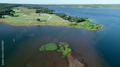 Aerial footage over water at Lake Skiatook from the Tall Chief Cove Campground. photo