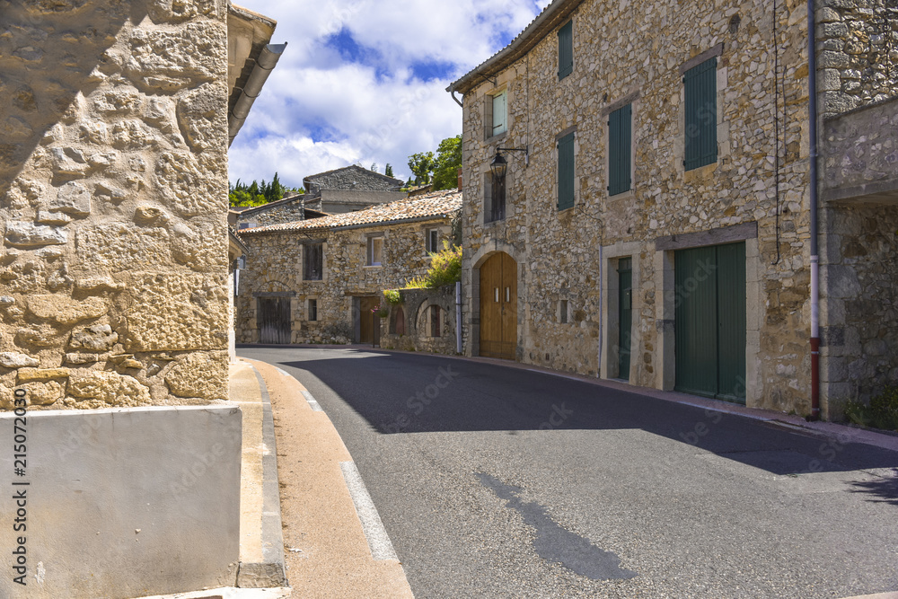 narrow street through the village Aurel, Provence, France, department Vaucluse, region Provence-Alpes-Côte d'Azur