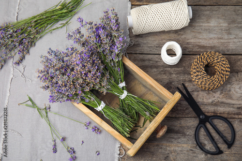 Fototapeta Naklejka Na Ścianę i Meble -  Flat lay composition with lavender flowers on table