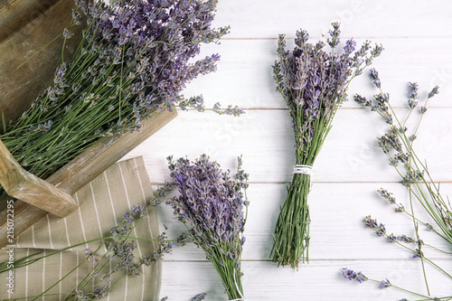 Fototapeta Naklejka Na Ścianę i Meble -  Flat lay composition with lavender flowers on wooden background