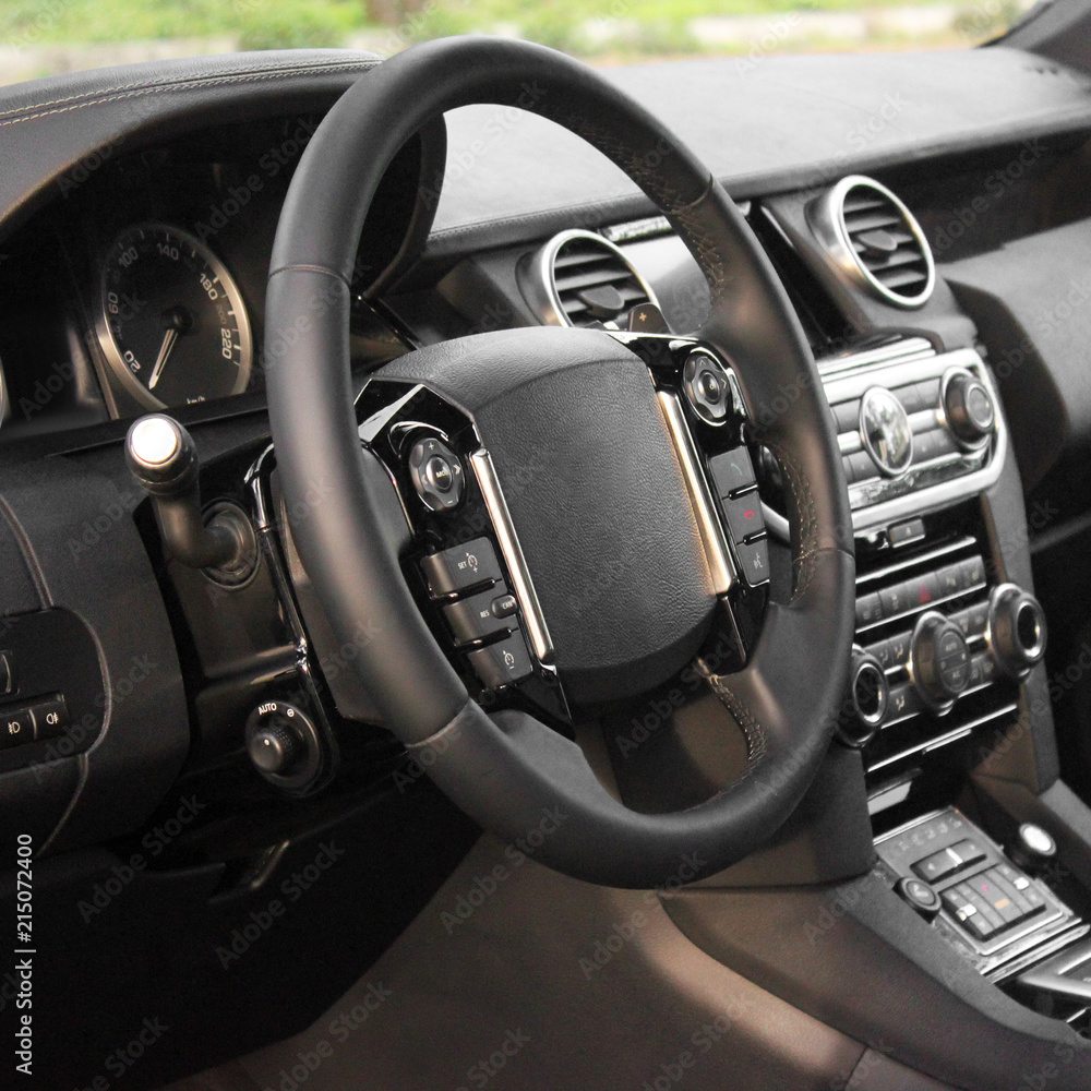 Car interior details. View of the interior of a modern automobile showing the dashboard Car interior details. View of the interior of a modern automobile showing the dashboard