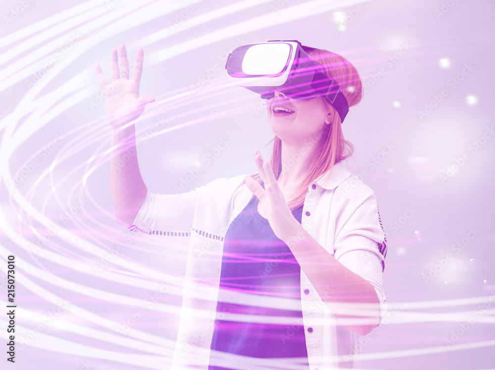 Woman with virtual reality headset playing video game on light background, colorful effect. Leisure and entertainment Woman with virtual reality headset playing video game on light background, colorful effect. Leisure and entertainment