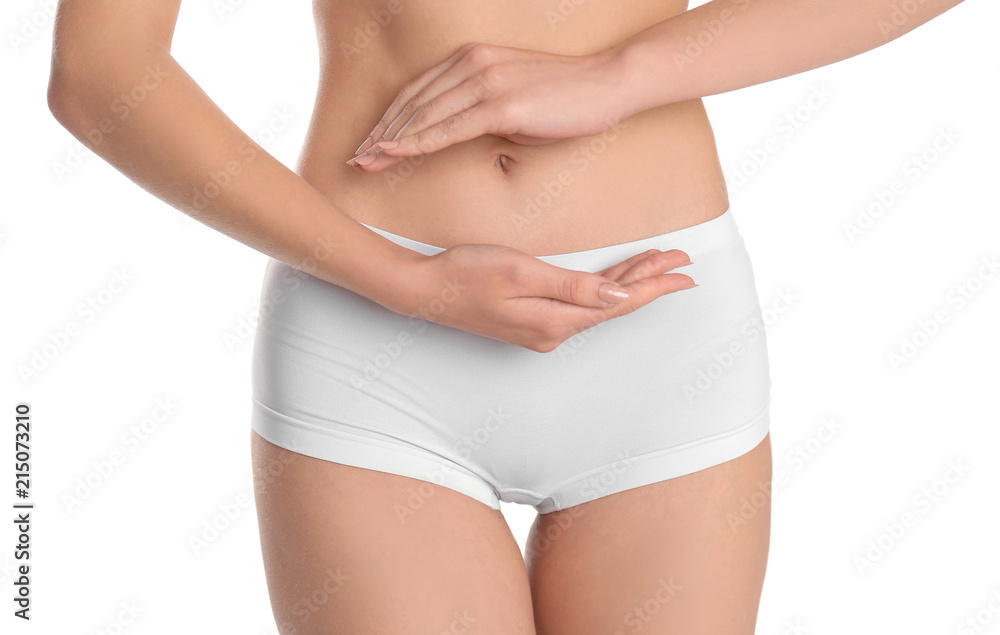 Young woman holding hands near underwear on white background. Gynecology Young woman holding hands near underwear on white background. Gynecology