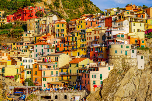 Beautiful view on a small Italian city of Manorola in Cinque Terre region. photo