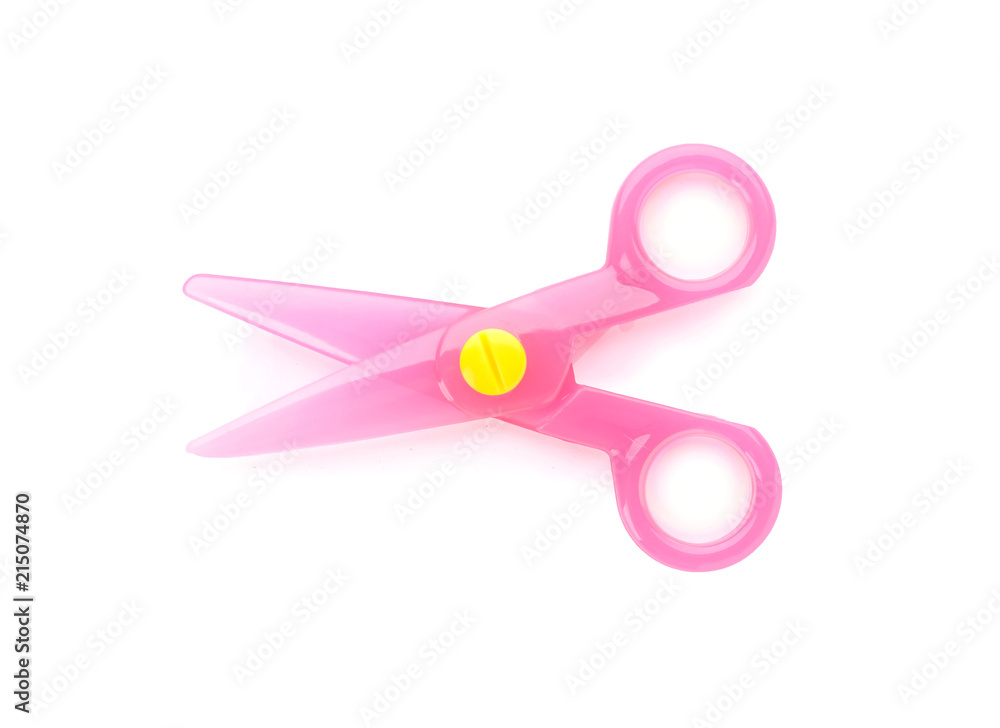 Pink plastic scissors on white background. Stationery for school Pink plastic scissors on white background. Stationery for school