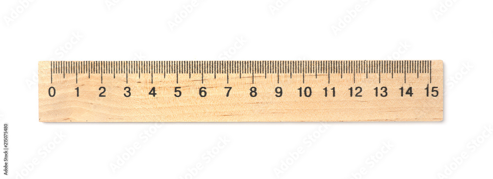 Wooden ruler on white background. School stationery Wooden ruler on white background. School stationery