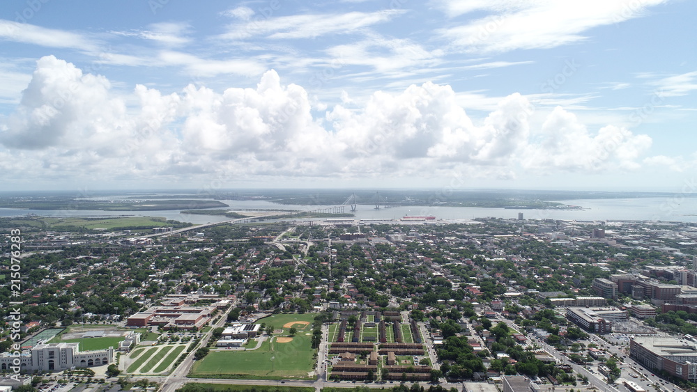 Aerial view of Charleston cityscape with bridge off in the distance. Aerial view of Charleston cityscape with bridge off in the distance.
