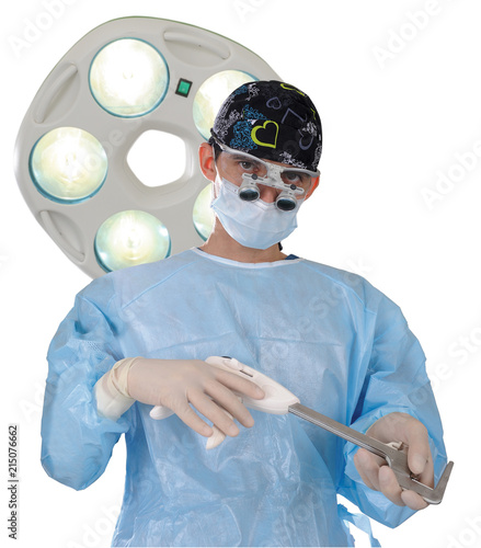 The surgeon performs a surgical operation using a special instrument and equipment. photo