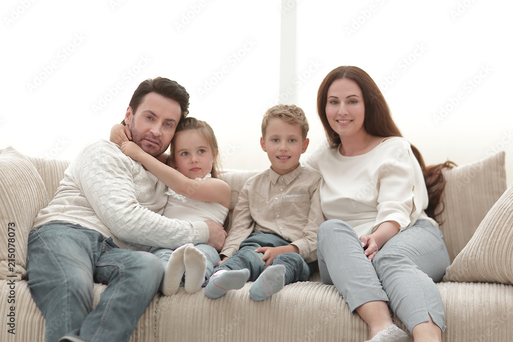 family sitting on the couch in the free evening. family sitting on the couch in the free evening.