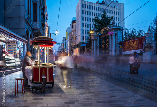 Photography Unidentified man sells grilled chestnut at Istiklal street