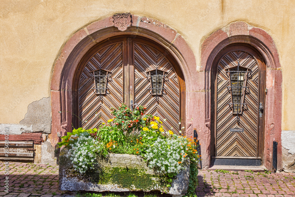 ..Entrance doors. The ancient city of Aegisheim. Wine Road Alsace. France.