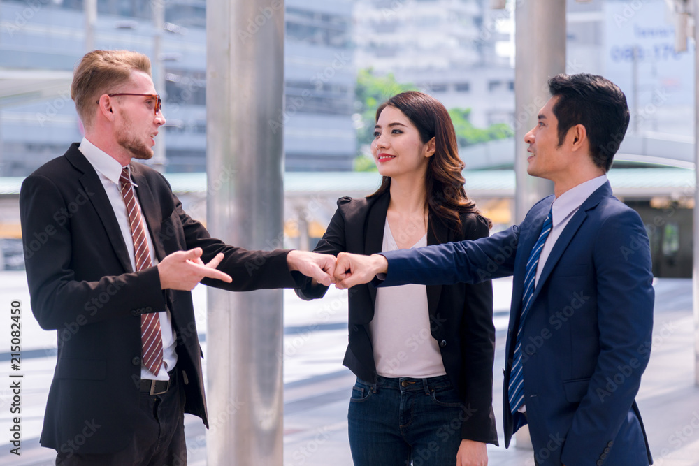 Business team with hands together - teamwork concepts Business team with hands together - teamwork concepts