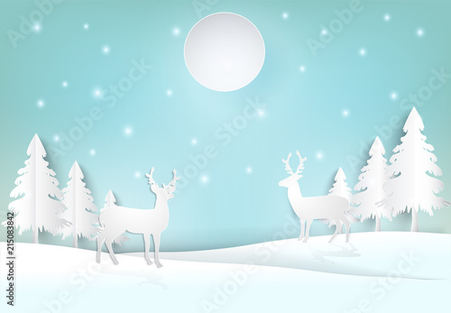 Winter holiday deer with snow and blue sky background. Christmas season paper art style illustration. © kheat