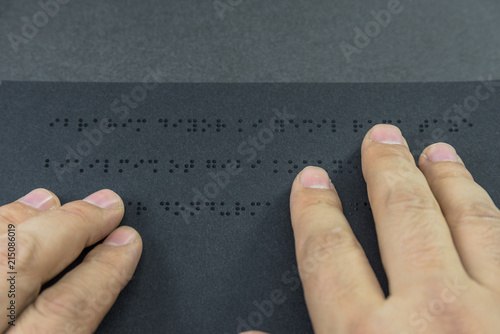 Top view of book in braille alphabet photo