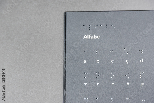 Top view of book in braille alphabet photo