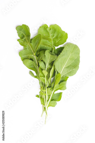 Fresh rucola leaves isolated on the white background
