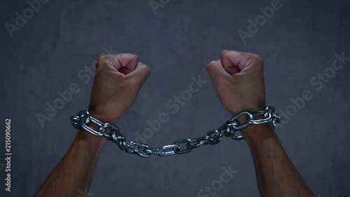Freedom, concept of free man, broken chain in slow motion
