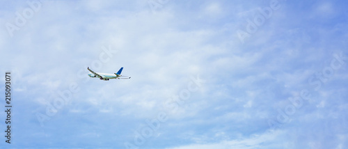 travel and transportation concept from aircraft fast and fly with blue sky and cloud background